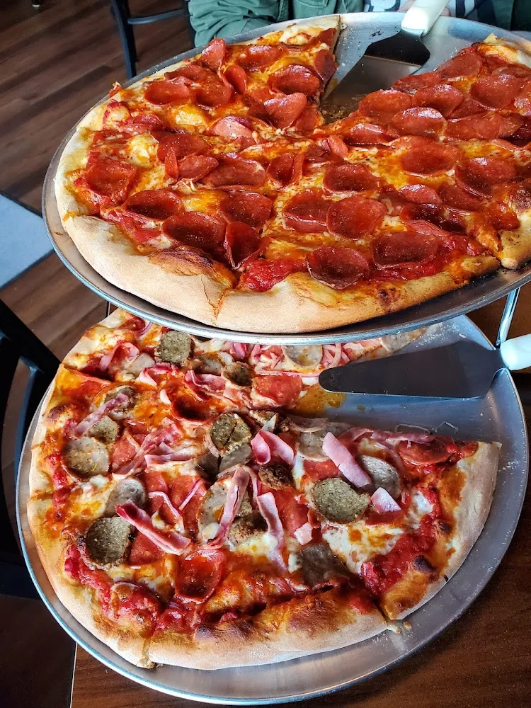 Pepperoni Thin Crust Pizza and Meatlovers with Onion Thin Crust